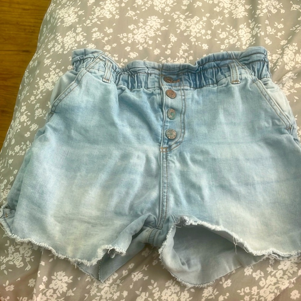 These CELERITY PINK shorts are size 14 in kids